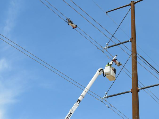 World's first robotic installation system for overhead power line spacers