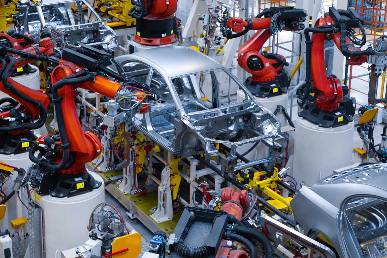 assembly-line-production-new-car-automated-welding-car-body-production-line-robotic-arm-car-production-line-is-working
